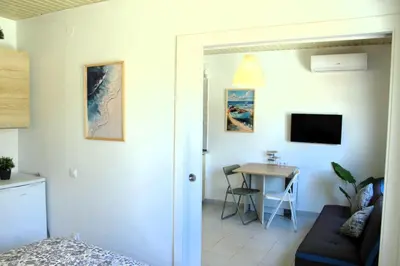 Una televisión o centro de entretenimiento en CBA COSTA BRAVA - Vela