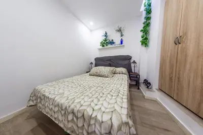 Cama o camas de una habitación en Terrace & BEACH apartment