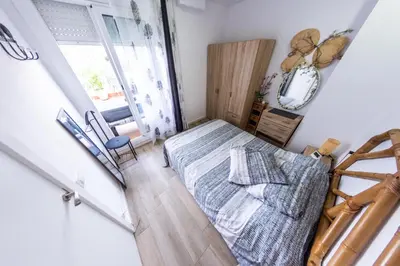 Cama o camas de una habitación en Terrace & BEACH apartment
