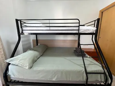 Cama o camas de una habitación en Santa Clotilde Family Apartment