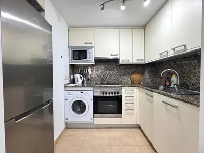 Una cocina o zona de cocina en Santa Clotilde Family Apartment
