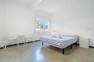 Cama o camas de una habitación en Hauzify I Apartament Riera