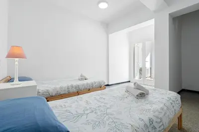 Cama o camas de una habitación en Hauzify I Apartament Riera