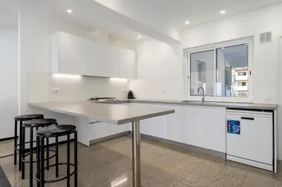 Una cocina o zona de cocina en Hauzify I Apartament Riera