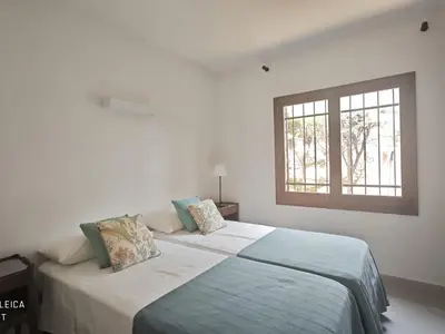 Cama o camas de una habitación en Villa Noguera