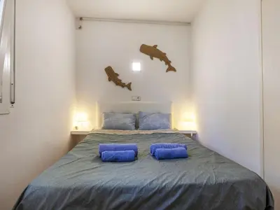 Cama o camas de una habitación en Apartment Buganvilla by Interhome