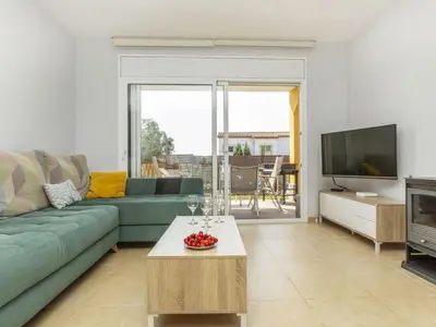 Una televisión o centro de entretenimiento en Holiday Home Together by Interhome