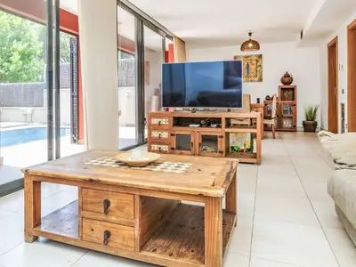 Una televisión o centro de entretenimiento en Holiday Home Kai by Interhome