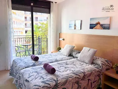 Cama o camas de una habitación en Zen Suite - Modern Apartment with Parking & Swimming Pool