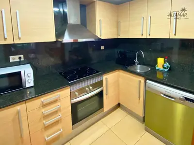 Una cocina o zona de cocina en Zen Suite - Modern Apartment with Parking & Swimming Pool