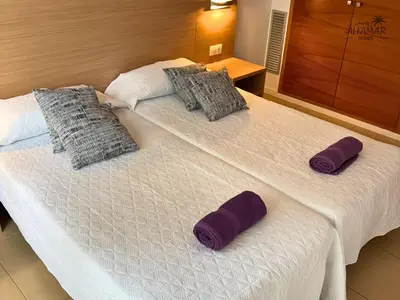 Cama o camas de una habitación en Kioto Suite - Modern Apartment with Parking & Swimming Pool