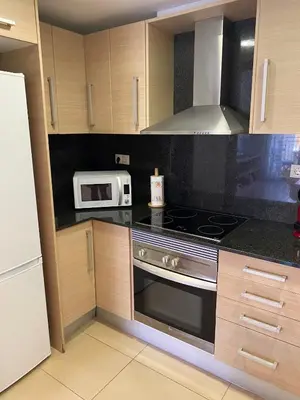 Una cocina o zona de cocina en Tokyo Suite - Modern Apartment with Parking & Swimming Pool