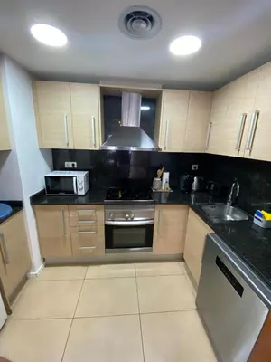 Una cocina o zona de cocina en Ikebana Suite - Modern Apartment with Parking & Swimming Pool