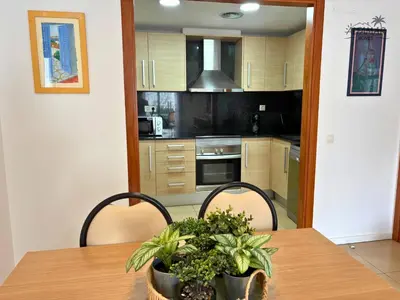 Una cocina o zona de cocina en Bali Suite - Modern Apartment with Parking & Swimming Pool