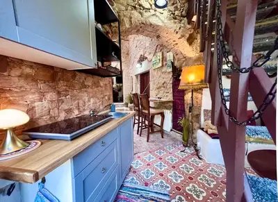 Una cocina o zona de cocina en Castell de Tati