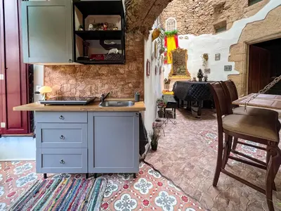 Una cocina o zona de cocina en Castell de Tati