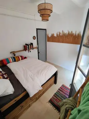 Cama o camas de una habitación en Bravissimo Calderers Nou, Monthly Apartment