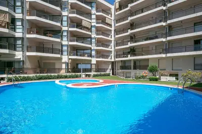 Piscina en o cerca de Piso familiar con piscina frente al mar