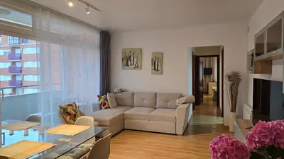 Zona de estar de Apartment America Go2Lloret