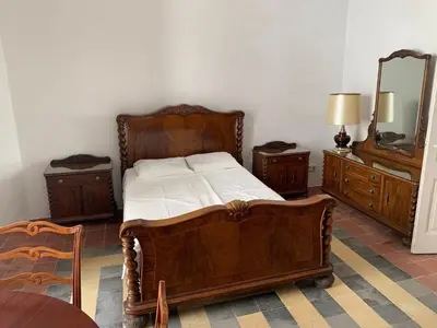 Cama o camas de una habitación en Casa l'àvia - Sant Pol de Mar