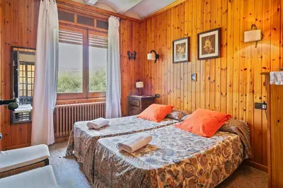 Cama o camas de una habitación en Winahost Villa Avenida Països Catalans
