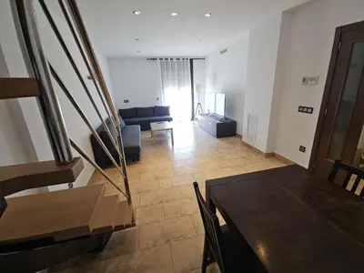 Zona de estar de Duplex amb terrassa al centre de Vidreres