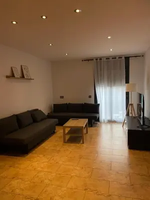 Zona de estar de Duplex amb terrassa al centre de Vidreres