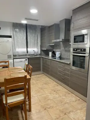 Una cocina o zona de cocina en Duplex amb terrassa al centre de Vidreres