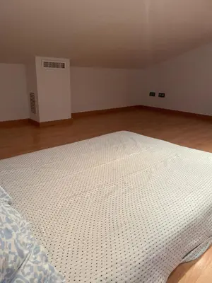 Cama o camas de una habitación en Duplex amb terrassa al centre de Vidreres