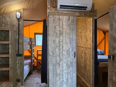 Cama o camas de una habitación en Camping Costa Dorada Tienda Lua