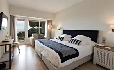 Cama o camas de una habitación en Hotel Aigua Blava