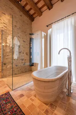 Un baño de Ola Living Playa del Castell