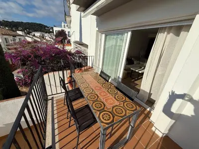 Un balcón o terraza de Apartamento para familias muy cerca de la playa
