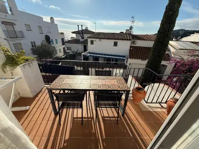 Un balcón o terraza de Apartamento para familias muy cerca de la playa