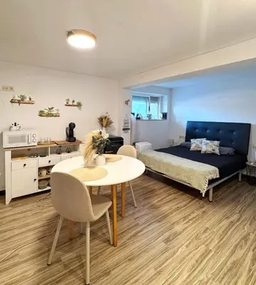Cama o camas de una habitación en Apartamento independiente con piscina