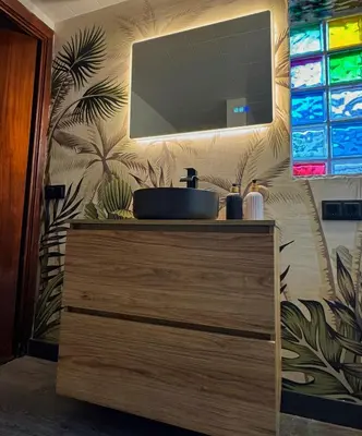 Una televisión o centro de entretenimiento en Apartamento independiente con piscina