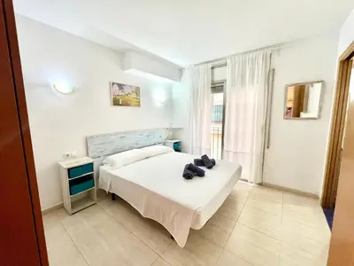 Cama o camas de una habitación en Fantástico apartamento en Sant Antoni, a solo 1 minuto de la playa