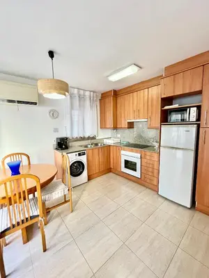 Una cocina o zona de cocina en Fantástico apartamento en Sant Antoni, a solo 1 minuto de la playa