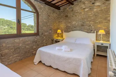 Cama o camas de una habitación en casa rural de ensueño
