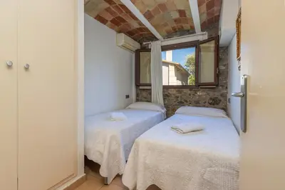 Cama o camas de una habitación en casa rural de ensueño