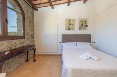 Cama o camas de una habitación en casa rural de ensueño