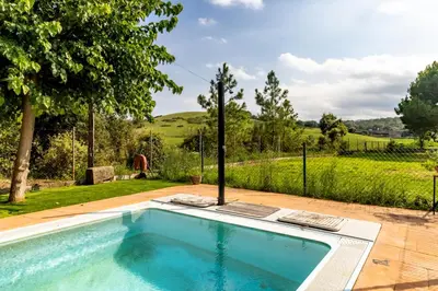 Piscina en o cerca de Can Noguer – Casa con piscina y jardín