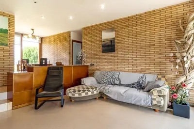 Zona de estar de Can Noguer – Casa con piscina y jardín