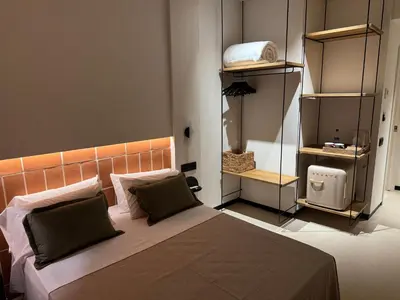 Cama o camas de una habitación en BELLADORA Hotel Boutique