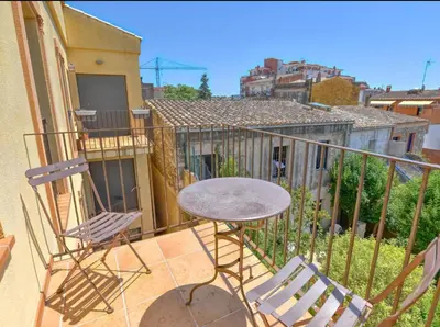 Un balcón o terraza de Appartement lumineux et central