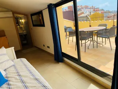 Cama o camas de una habitación en Bright and central apartment