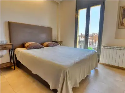 Cama o camas de una habitación en Bright and central apartment