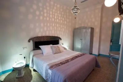 Cama o camas de una habitación en Hotel Hostal Chic