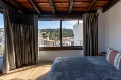 Cama o camas de una habitación en Seamount, Apartment beside Beach with Balcony