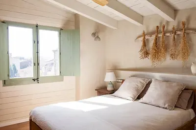Cama o camas de una habitación en Apartamento encantador en el Baix Empordà